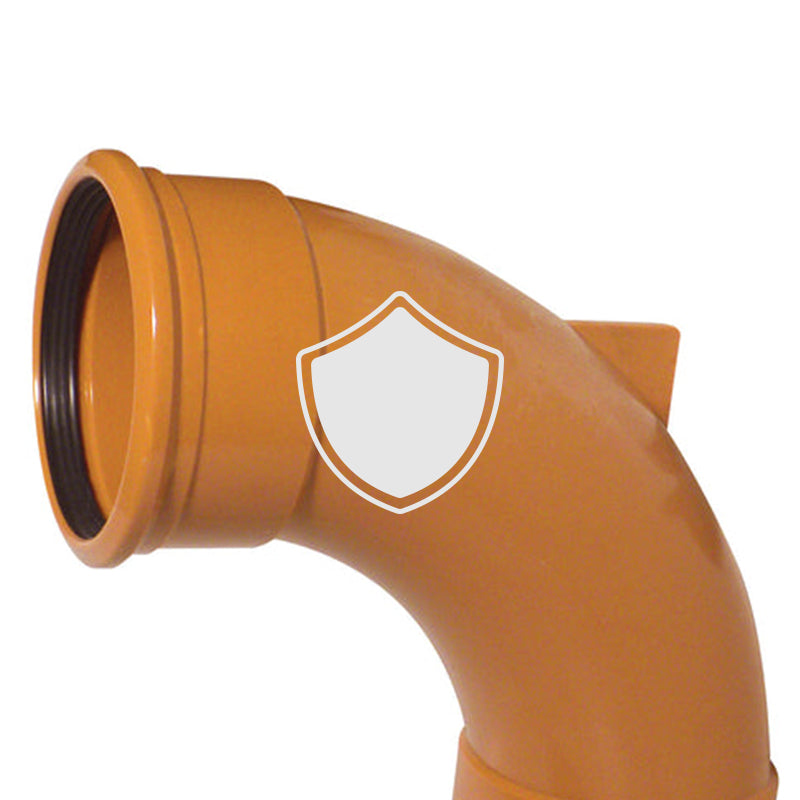an image of a terracotta underground pipe bend with a shield icon on the top of it